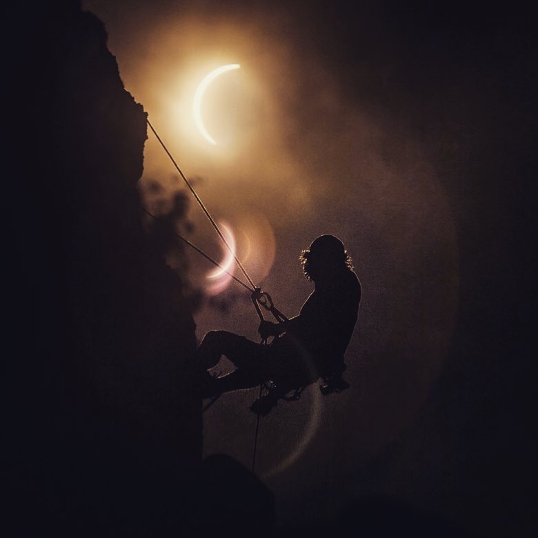 Climber during eclipse