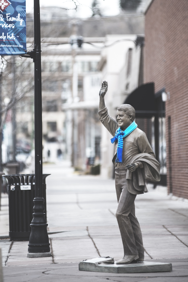 President statue downtown scarf